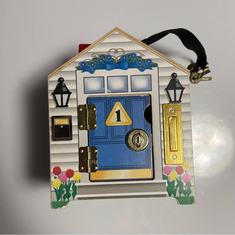 Wooden House with four keys and working doorbells